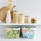Pantry storage with glass containers and space-saving baskets for home organisation.