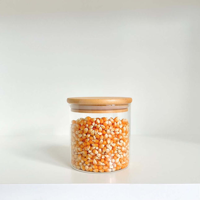 700ml Glass Storage Jar with Bamboo Lid filled with popcorn kernels, ideal for kitchen organisation and pantry storage.