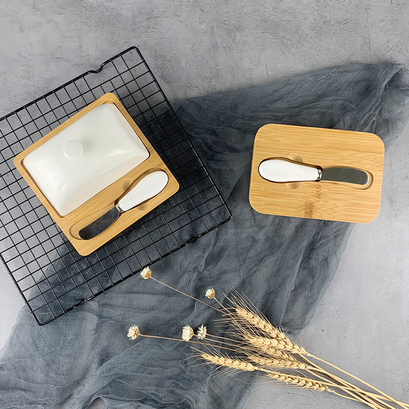 Ceramic Butter Dish with Bamboo Base on display for kitchen organisation, highlighting a stylish storage organiser.