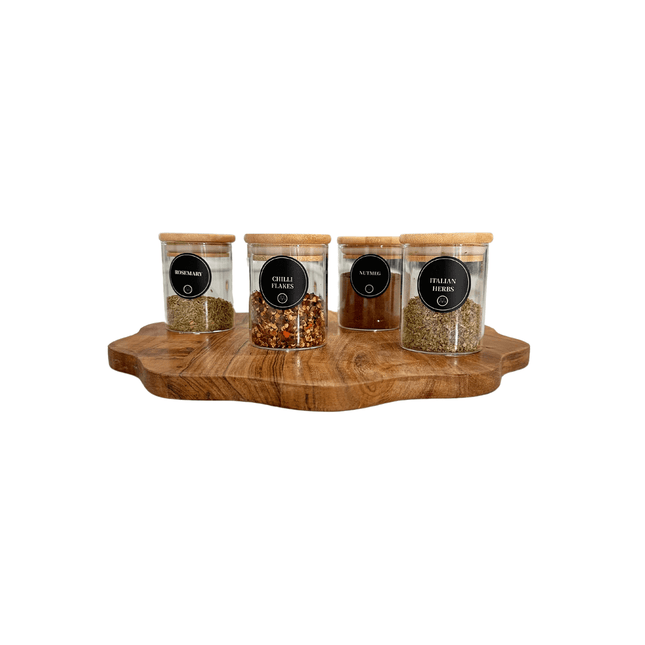 Round Herb & Spice Labels – Pack of 110 on glass jars with wooden lids, perfect for kitchen and pantry organisation.