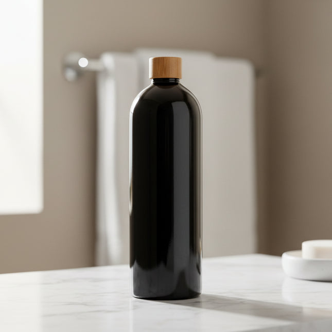 Black Screw Top Bottle – 1 L Refillable Storage for kitchen and pantry organisation, ideal for storing liquids on countertops.