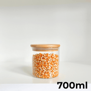 Round Bamboo Pantry Glass Jar Set – 5 Stackable Sizes showing 700ml jar filled with corn kernels for efficient kitchen storage.