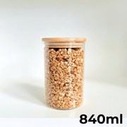 Round Bamboo Pantry Glass Jar Set – 5 Stackable Sizes, ideal for kitchen storage organisers, featuring 840ml size filled with oats.