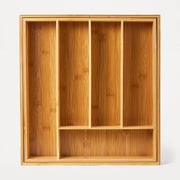 Wooden shelf with compartments on a white background