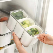 Triple Clear Fridge Organiser with Removable Baskets storing green vegetables in a fridge, enhancing kitchen and pantry organisation.