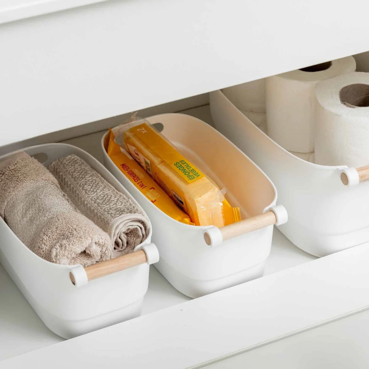 Small White Storage Tub – Stylish with Wooden Handles used for drawer organisation, ideal under sink storage for toiletries and towels.