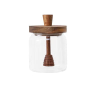 Glass Honey Jar with Wooden Lid & Dipper ideal for kitchen storage and pantry organisation. Enhances glass jars collection.