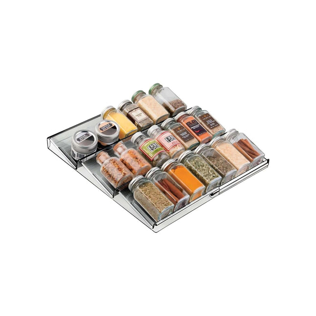 Expandable In-Drawer Spice Rack filled with glass jars for kitchen organisation and efficient pantry storage.