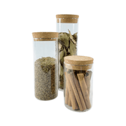 Glass Storage Jars with Cork Lid – 275ml used for kitchen organisation, showcasing stored spices and herbs in a pantry setting.