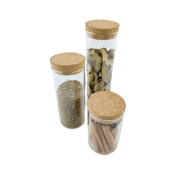 Set of glass storage jars with cork lids for pantry organization