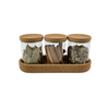 Glass trio set with cork lids, perfect for kitchen pantry storage and organization.