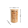 Round glass pantry jar with bamboo lid, 10 cm diameter, filled with granola.