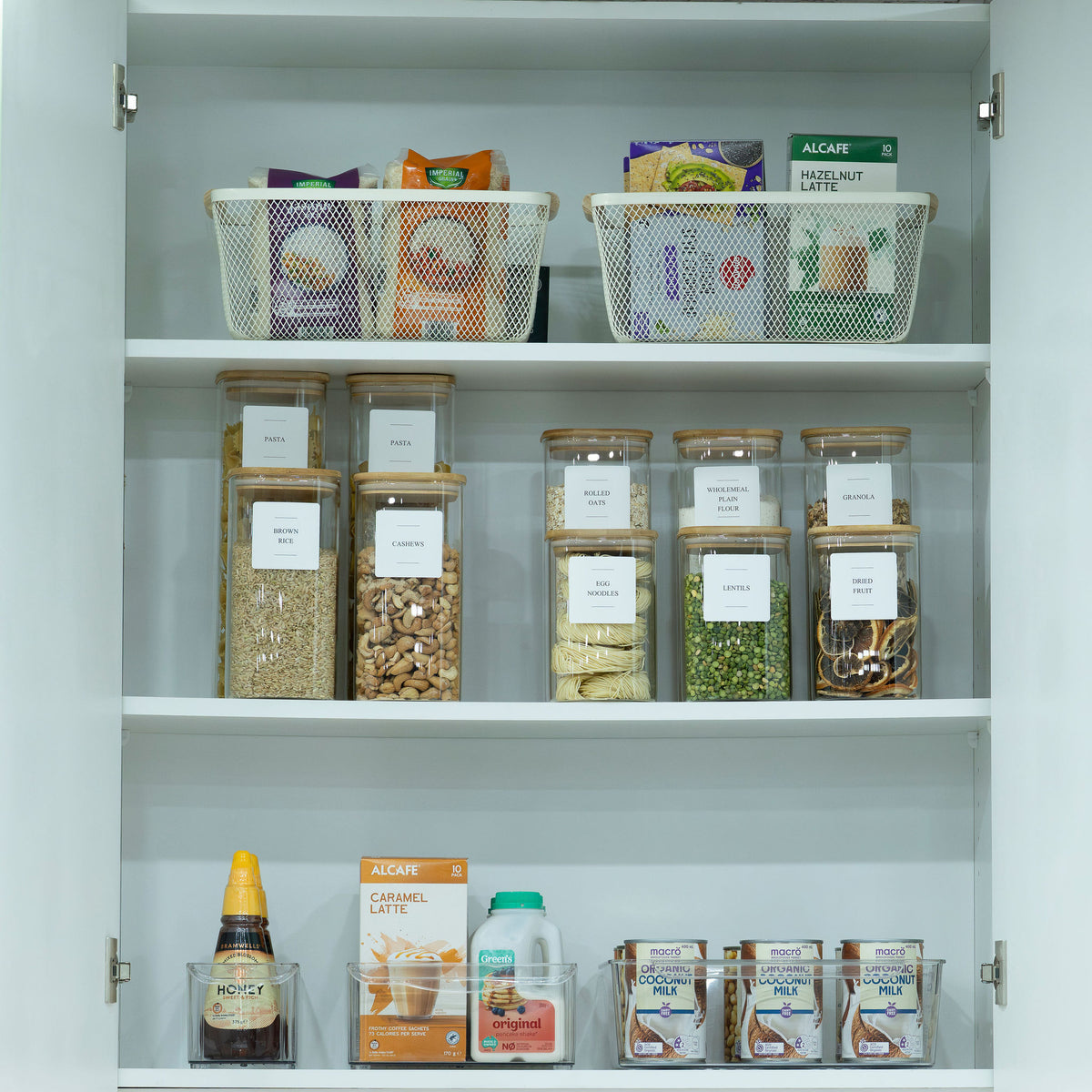 Alt Tag: Small Pantry Reset Pack with storage organisers for neat pantry shelves featuring glass jars and baskets.