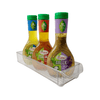 Clear mini storage tub with lip holding salad dressing bottles, ideal for pantry organization.