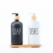 Glass Pump Bottles + Bamboo Tray – 500 ml Set for kitchen with black and white soap dispensers.