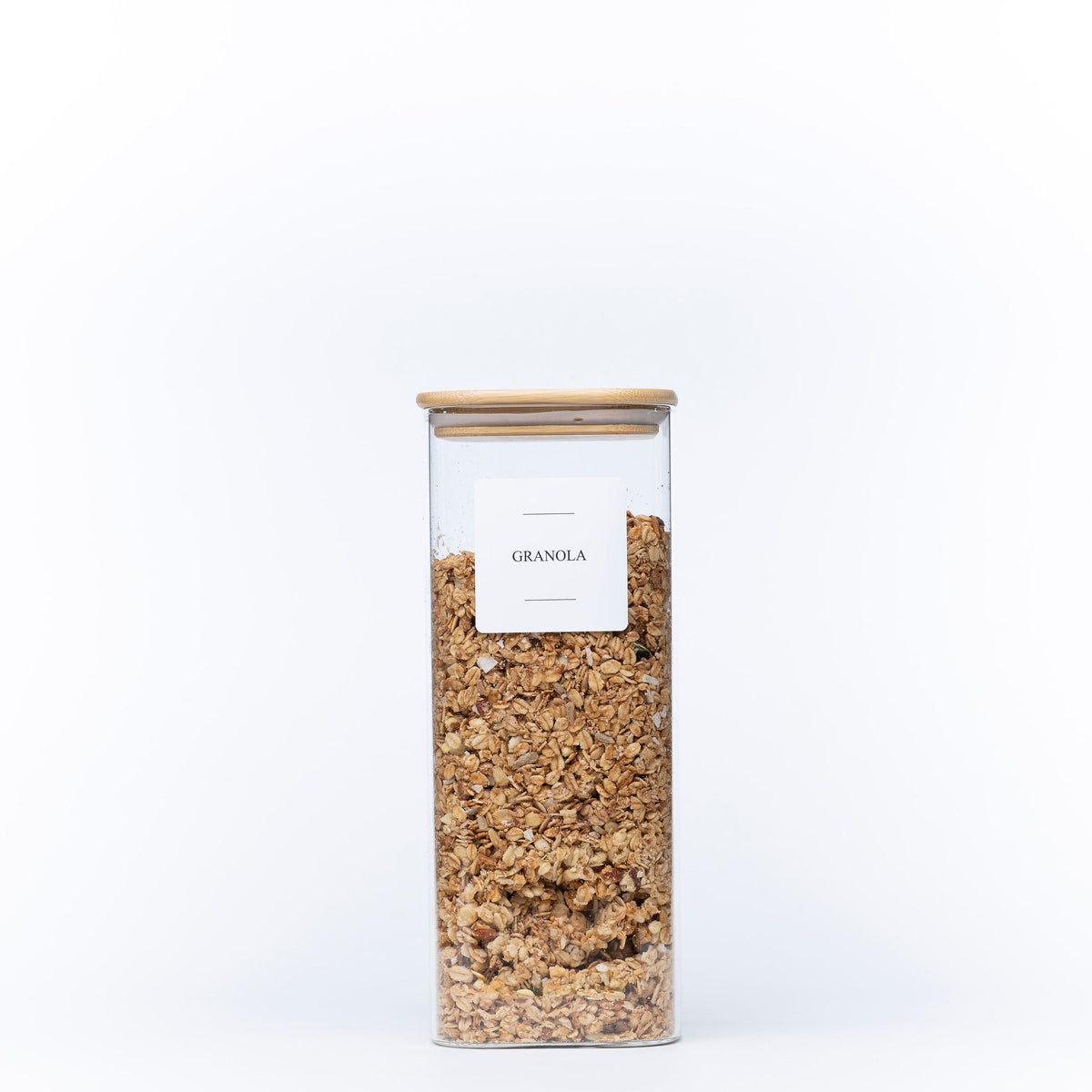 Square Glass Jar with Bamboo Lid – 1500ml Pantry Storage for kitchen organisation filled with granola. Ideal for pantry organisation.
