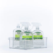 Clear storage organisers holding spray bottles as part of Small Pantry Reset Pack for efficient kitchen and pantry organisation.