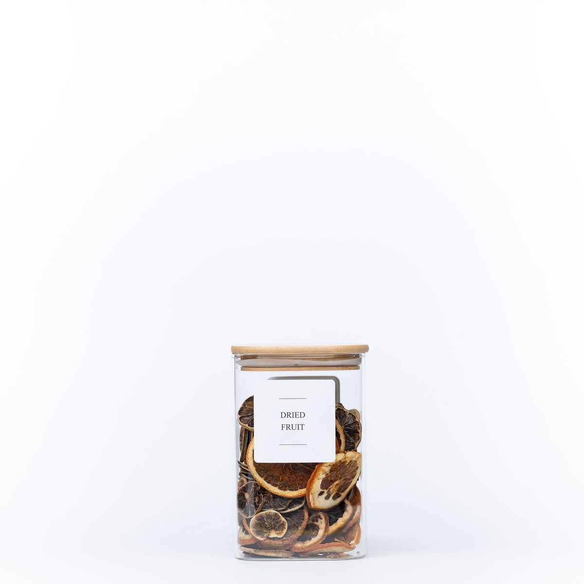 Square Glass Jar with Bamboo Lid – 1100ml Pantry Storage, filled with dried fruit for kitchen and pantry organisation.