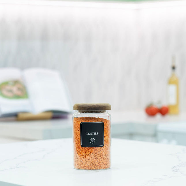 900ml Acacia Glass Jar – Airtight Kitchen Storage on marble countertop, perfect for pantry organisation using storage organisers.