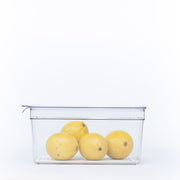 Clear Fridge Organiser with Lid storing lemons in a tidy kitchen setting, ideal for efficient fridge organisation and storage.