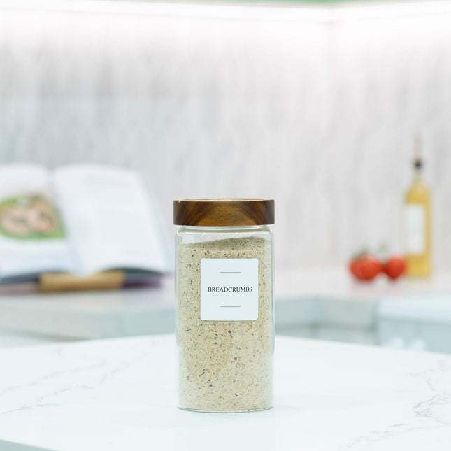1200ml Acacia Screw-On Glass Pantry Jar storing breadcrumbs for kitchen organisation on a marble countertop.