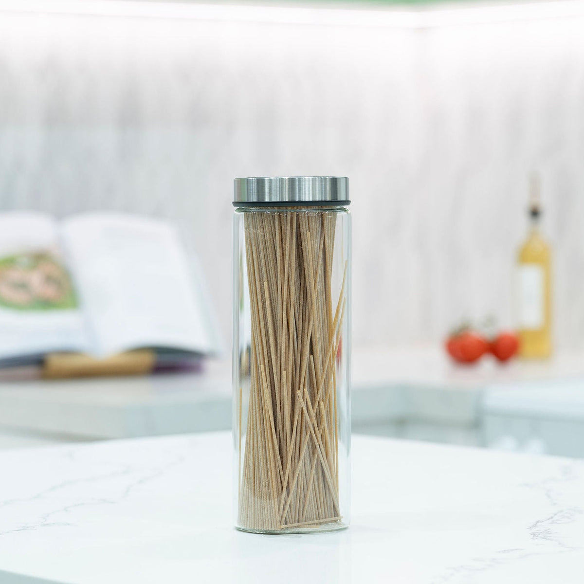 Glass Storage Jar – 1300ml with Clear Top Lid used for kitchen organisation, conveniently stores spaghetti on a marble benchtop.