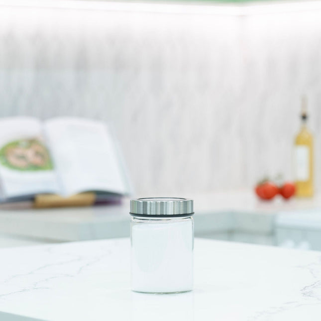 Glass Storage Jar – 750ml with Clear Stainless Lid on marble countertop, ideal for kitchen organisation and pantry storage.