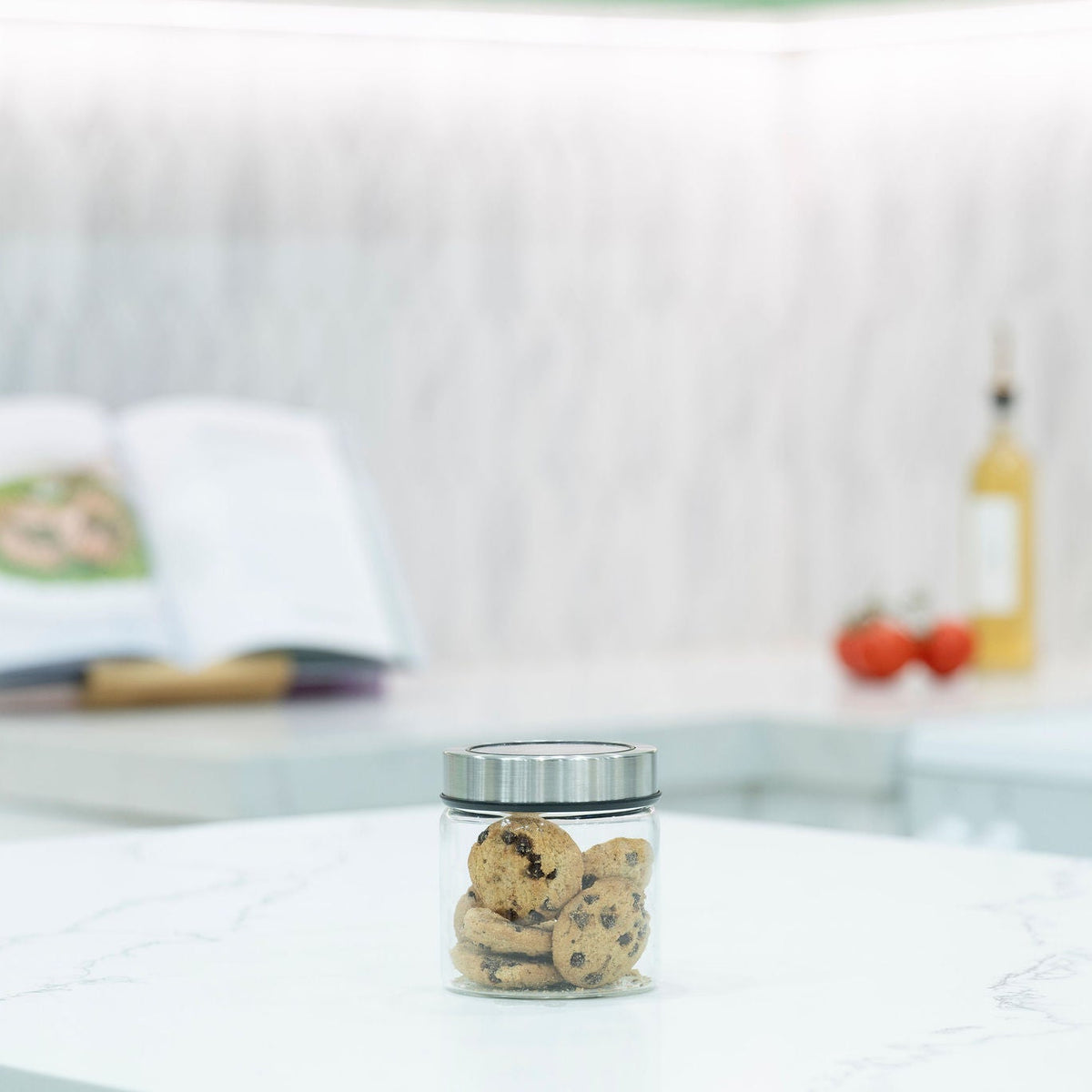 Glass Storage Jar – 400ml with Clear Stainless Lid, ideal for kitchen organisation, holding cookies on a marble countertop.