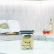 Glass jar with noodles from the Family Pantry System Pack, ideal for pantry organisation and kitchen storage efficiency.