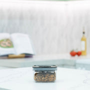 Black Airtight Container with Twist Lock – 500ml on kitchen bench storing almonds, ideal for pantry and kitchen organisation.