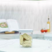 White Airtight Container with Twist Lock – 1300ml holding pasta, ideal for kitchen organisation and storage organisers on a benchtop.