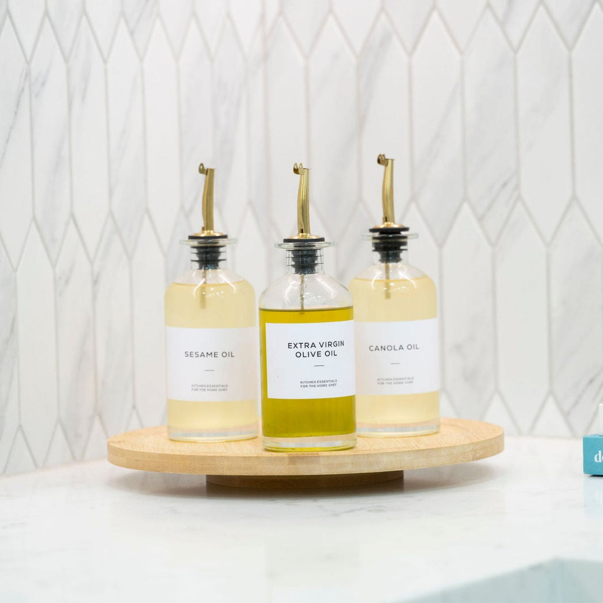 Round Glass Oil & Vinegar Bottle – 350ml Dispenser on a kitchen countertop for pantry organisation and kitchen storage.