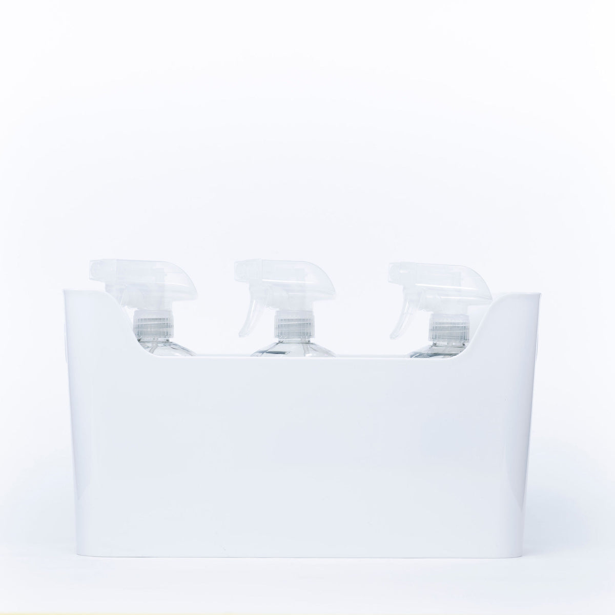 White Pull-Out Organiser with spray bottles for efficient under sink storage in kitchens and bathrooms, enhancing organisation.