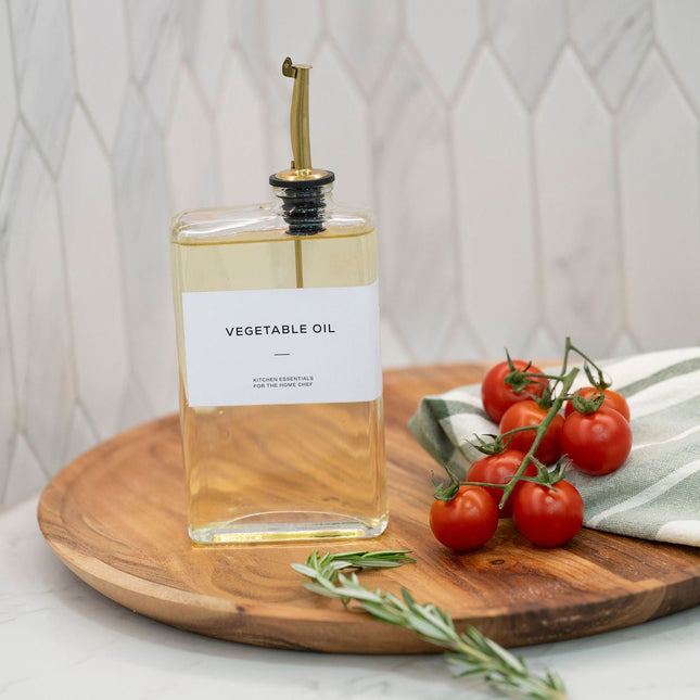 Glass Oil & Vinegar Dispenser Set – Book Style (2 x 350ml) on kitchen bench, ideal for kitchen organisation with fresh tomatoes.