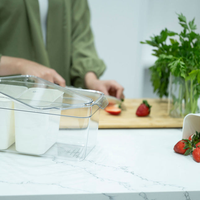 Triple Clear Fridge Organiser with Removable Baskets on kitchen counter for efficient fridge storage and kitchen organisation.