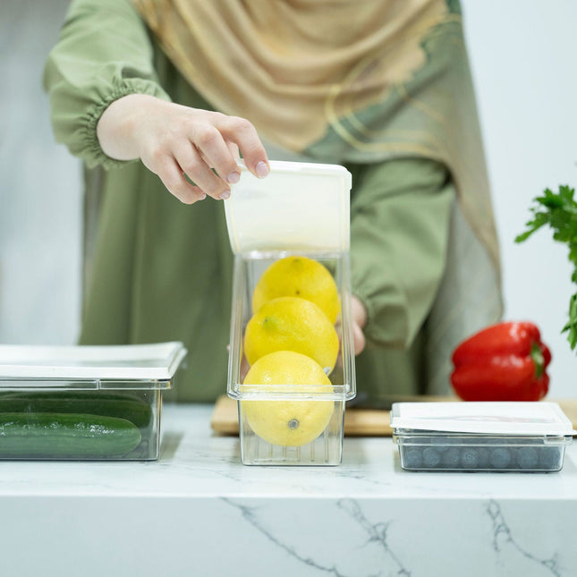 Medium Airtight Food Storage Container being used for fridge organisation with lemons, showcasing kitchen storage organisers.