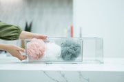 Clear Modular Drawer Organiser – Large used for bathroom storage of bath sponges, showcasing versatile under sink storage solution.
