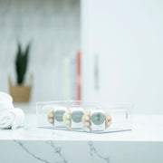 Clear Multi-Use Storage Tub With Lip – Small for pantry organisation displayed on a kitchen counter with spice jars inside.