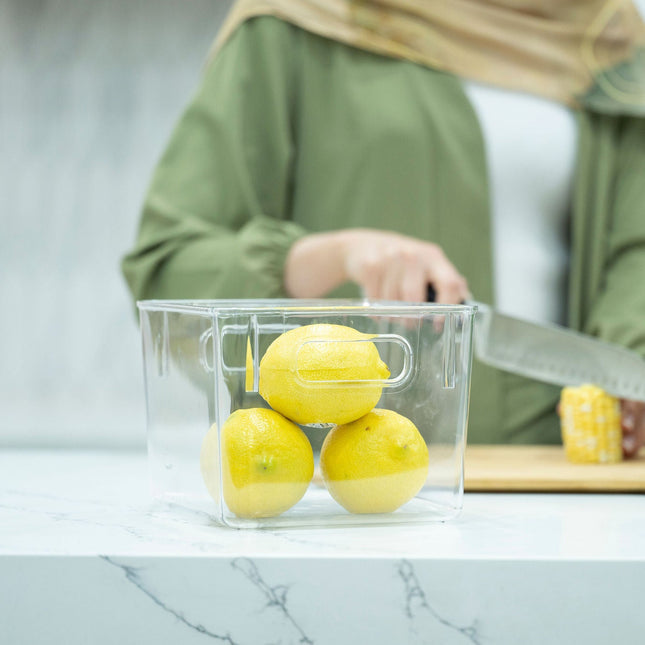 Clear Multi-Use Storage Tub With Lip – Large holding lemons on a kitchen counter, ideal for pantry and fridge organisation.