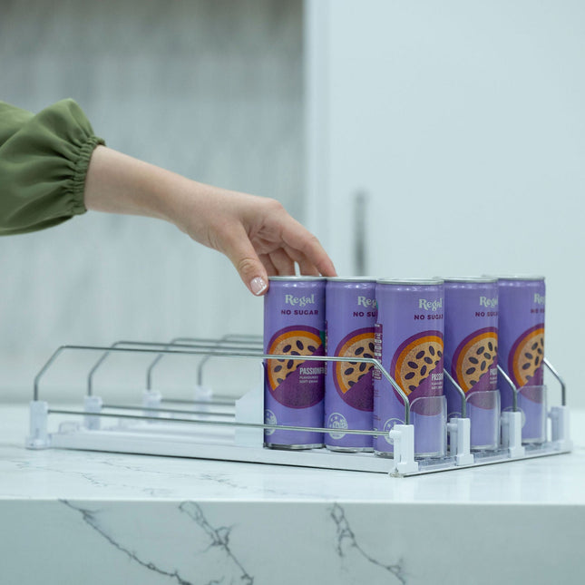 Person reaching for a can on a Sliding Can Organiser – Compact, Easy Access Storage, ideal for pantry or kitchen organisation.