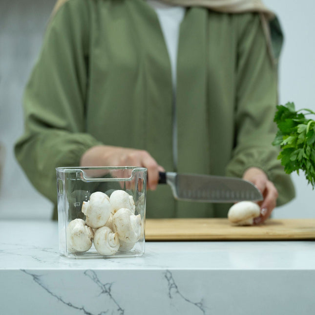 Clear Multi-Use Storage Tub With Lip – XS holding mushrooms on kitchen counter, ideal for pantry and fridge organisation.