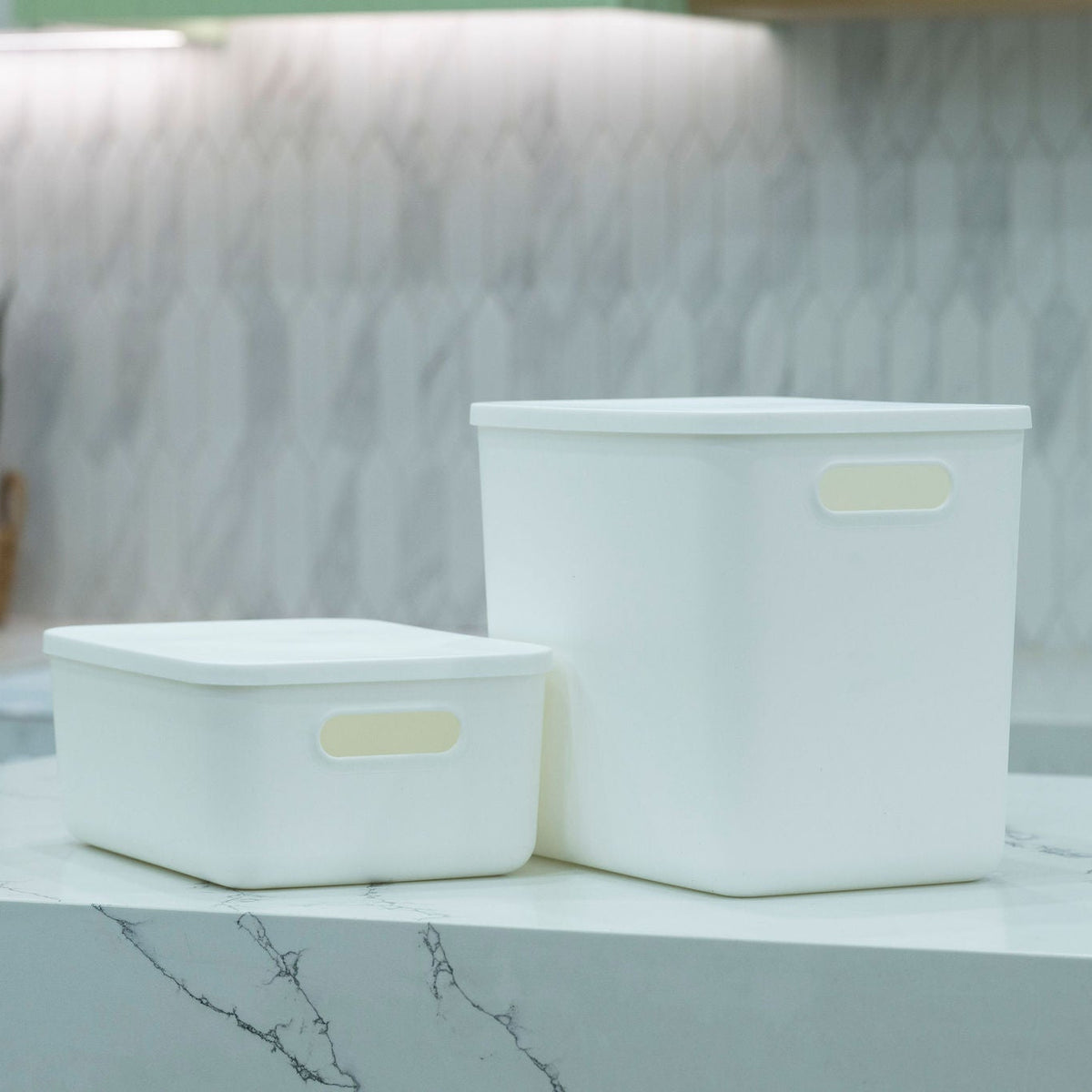 Medium White Storage Tub with Lid on kitchen bench, perfect for pantry organisation or under sink storage, ideal as storage organisers.