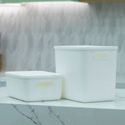Medium White Storage Tub with Lid on kitchen bench, perfect for pantry organisation or under sink storage, ideal as storage organisers.