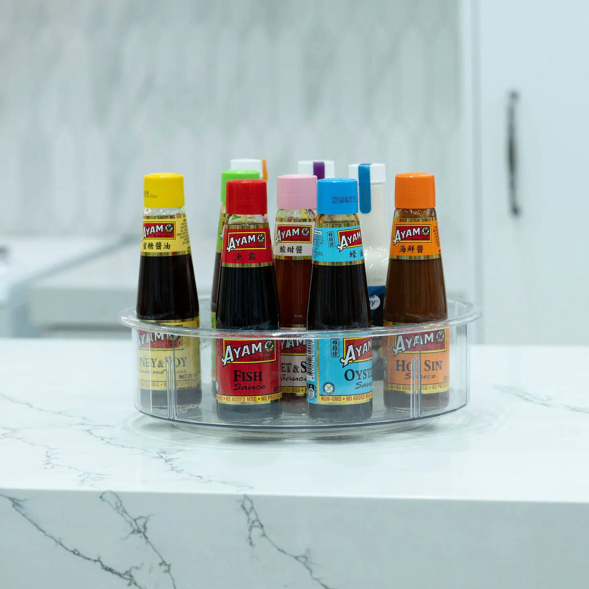 Rotating spice rack in a kitchen from the Family Pantry System Pack, ideal for kitchen organisation and easy access to condiments.