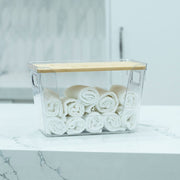 Clear Storage Container with Bamboo Lid – 29cm used for bathroom towel organisation, enhancing under sink storage efficiency.