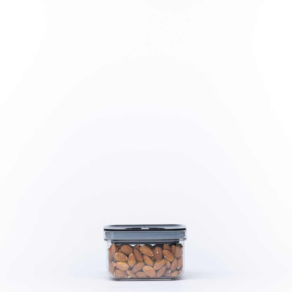 Black Airtight Container with Twist Lock – 500ml filled with almonds, perfect for kitchen and pantry organisation.