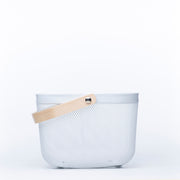 Small White Mesh Basket with Wooden Handle perfect for under sink storage, blending style and function in home organisation.