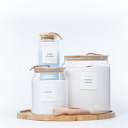 Glass jars set from New Home Set Up Pack for pantry organisation, ideal for storing napisan, washing powder, and fabric softener.