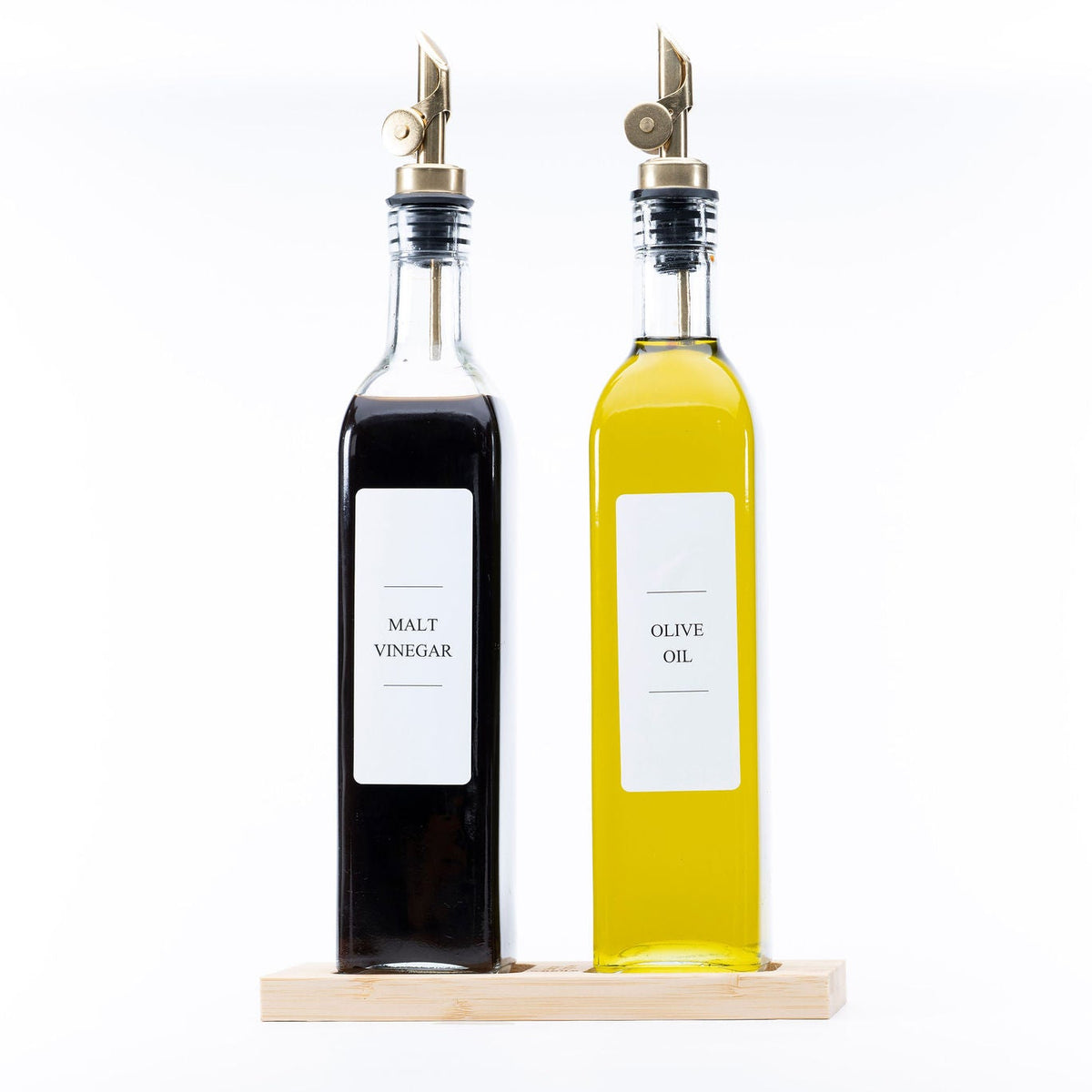 Clear Oil & Vinegar Bottle – 500 ml set on kitchen counter for efficient kitchen organisation and storage.