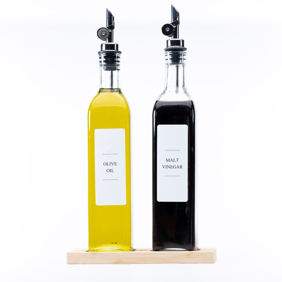 Clear Oil & Vinegar Bottle – 500 ml on kitchen counter for efficient storage and pantry organisation. Ideal for kitchen organisation.